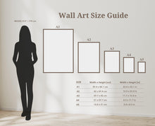 Cargue la imagen en el visor de la galería, a woman standing in front of a wall size guide

