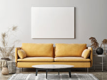Cargue la imagen en el visor de la galería, a living room with a couch and a coffee table
