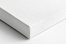 Cargue la imagen en el visor de la galería, a close up of a white mattress on a white surface
