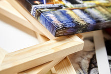 Cargue la imagen en el visor de la galería, a close up of a painting on a table
