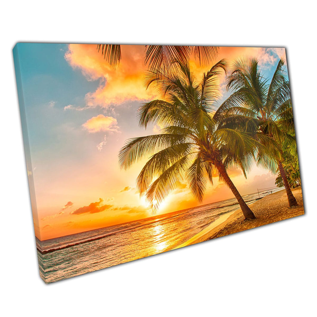 Tall Palm Trees On Gold Sandy Beach Leaning Over The Calm Ocean During A Warm Sunset Wall Art Print On Canvas Mounted Canvas print