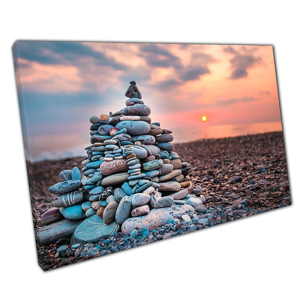 Pyramid Of Smooth Stacked Zen Stones On A Rocky Beach At Sunset Tranquil Seascape Wall Art Print On Canvas Mounted Canvas print