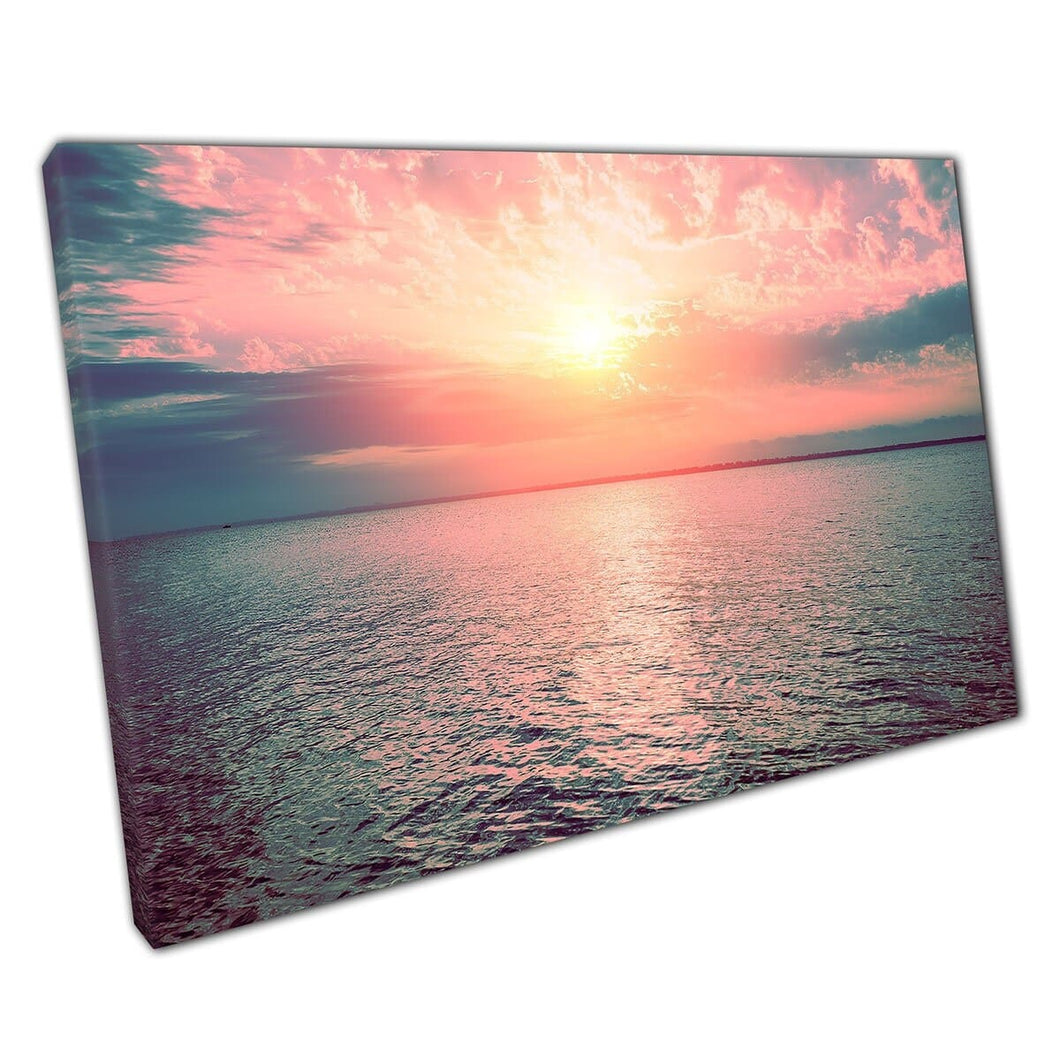 Beautiful Pink Peach Toned Sunrise Through A Soft Cloudy Sky Over A Tranquil Seascape Wall Art Print On Canvas Mounted Canvas print