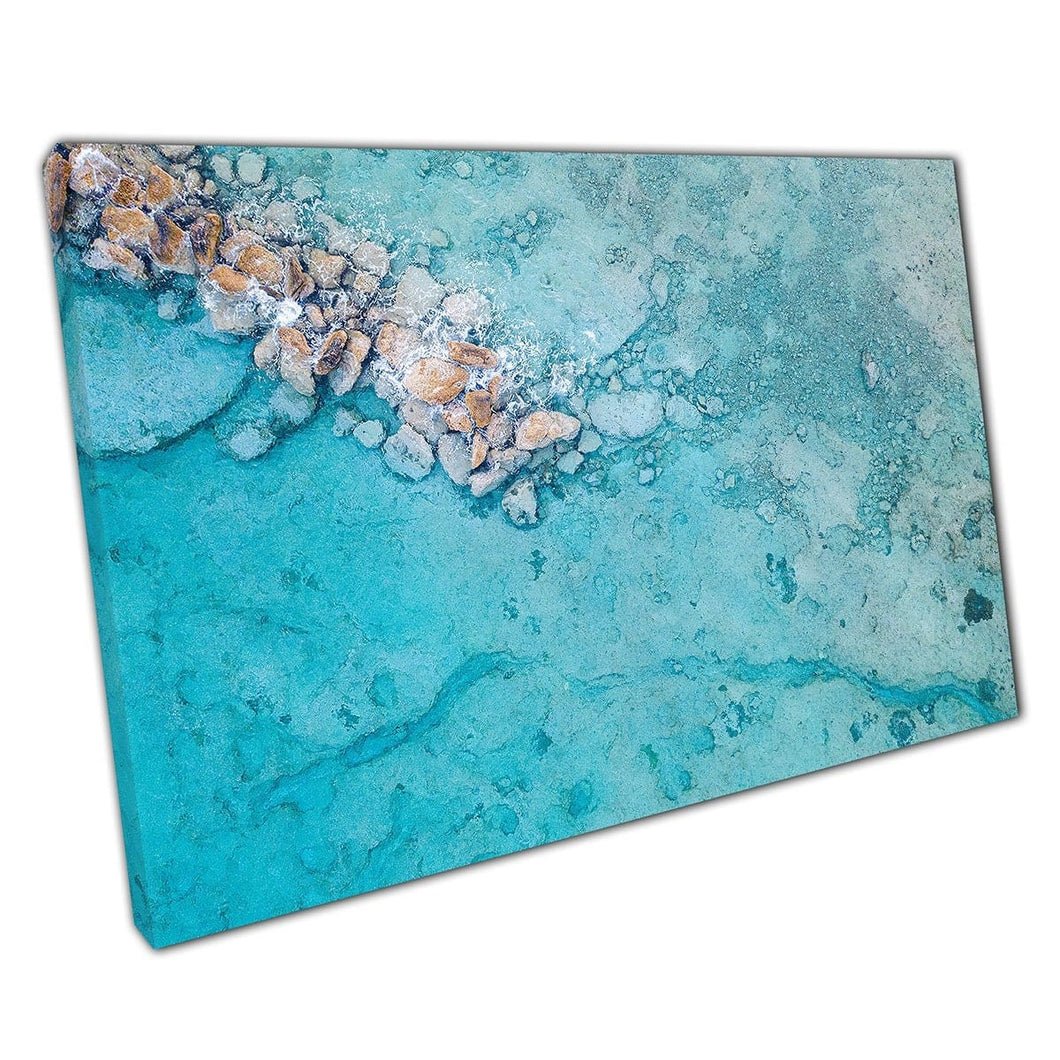 Aerial View Of Crystal Clear Shallow Blue Seascape Closing In On Clusters Of Rocks Wall Art Print On Canvas Mounted Canvas print